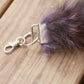 Purple Raccoon Tail Keychain